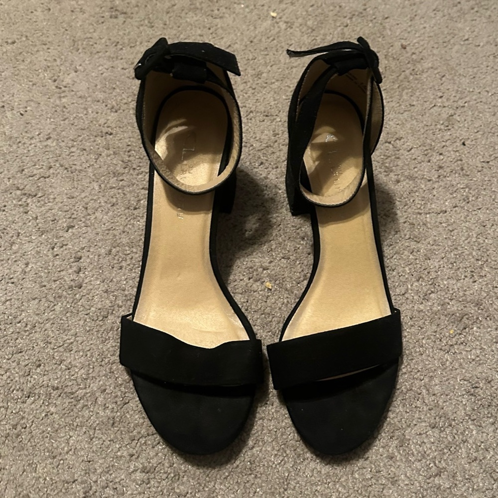 Plain black slightly fuzzy (supposed to be) heels